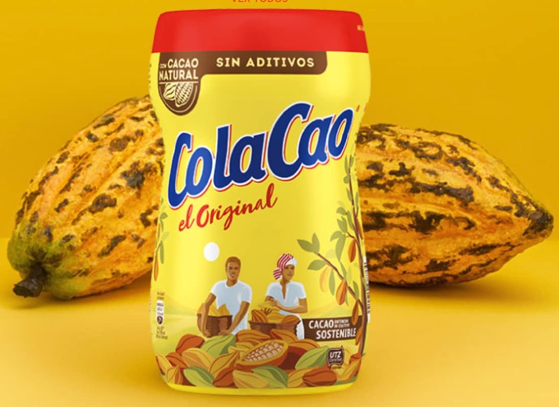 Cola Cao original chocolate drink mix steaming mug offering warm indulgence.