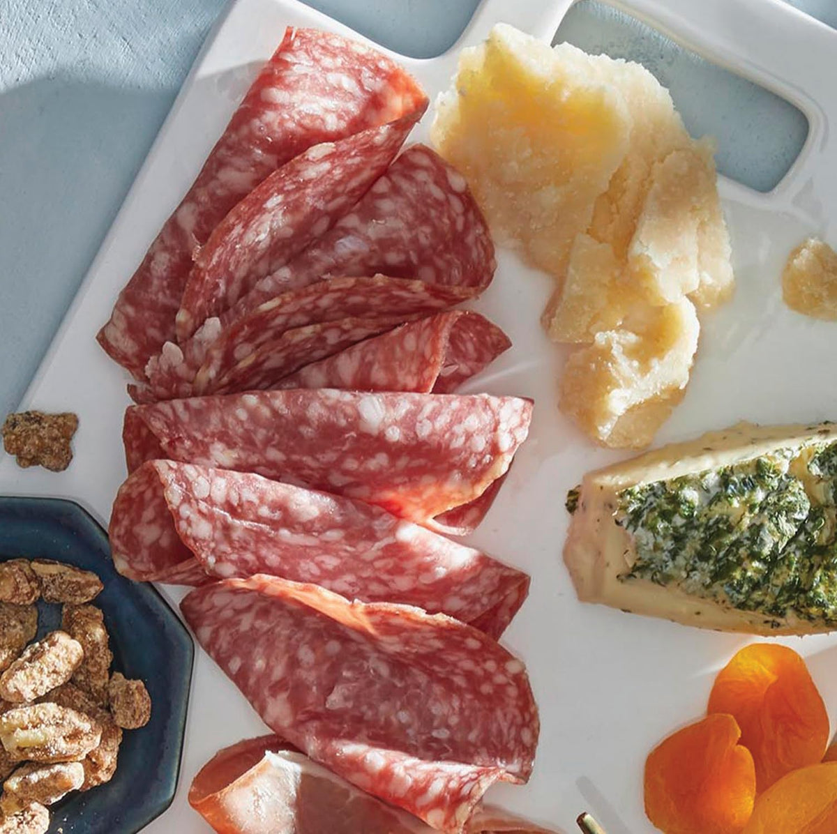 COLAMECO'S Classico Salami Trio uncured meats image emphasizes natural ingredients for clean snacking
