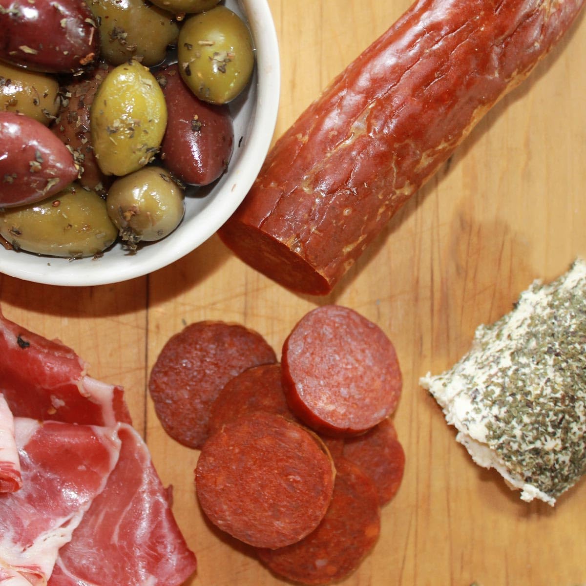 Colameco's pepperoni-salami-on-pizza adds savory topping to any pie.