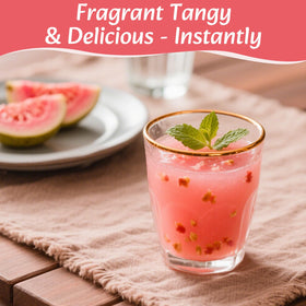 Pouring guava powder into a glass for a tropical beverage