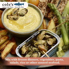 Cole's smoked mussels plated with greens, a tasty protein topping.