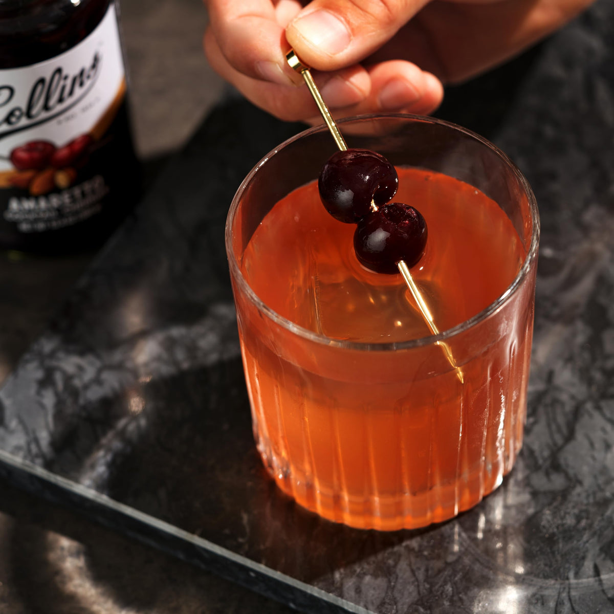 Collins Chicago amaretto sours garnish elevates cocktails with almond notes.