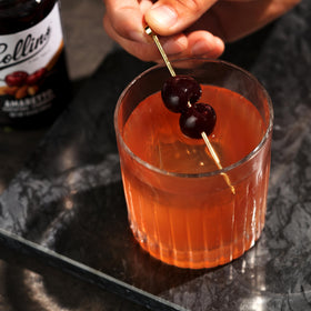 Collins Chicago amaretto sours garnish elevates cocktails with almond notes.