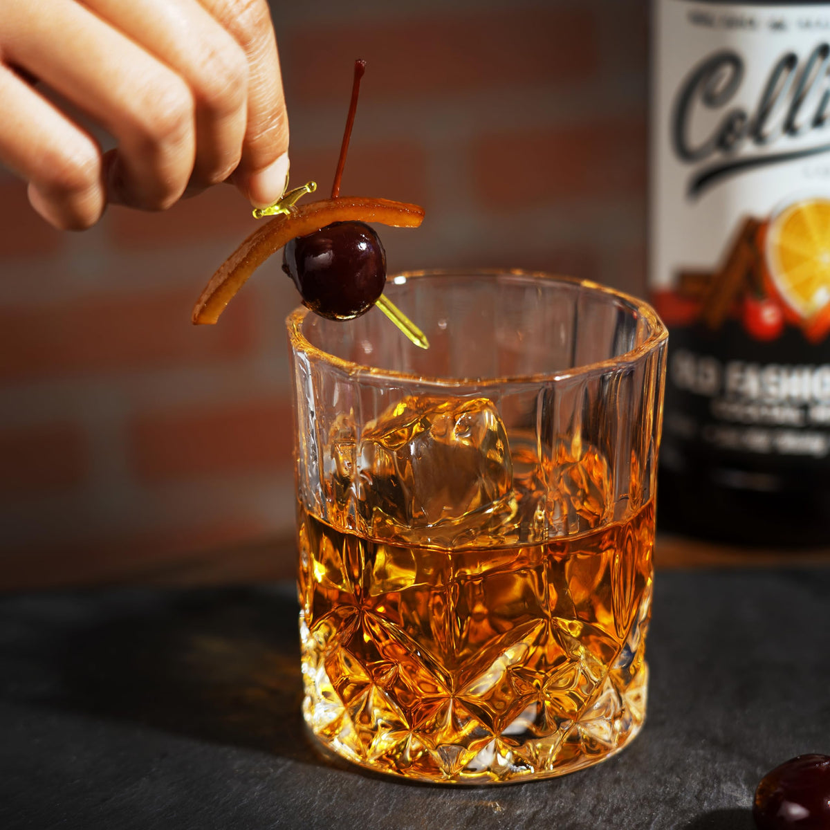 Collins mix being poured into a glass for a balanced base