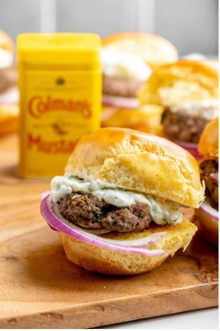 Colman's mustard powder sprinkled on grilled meat for tangy flavor