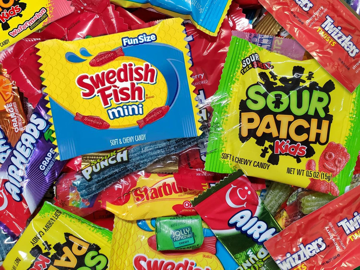 Colorful candy display adds festive vibe to the dessert table.
