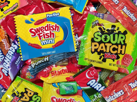 Colorful candy display adds festive vibe to the dessert table.