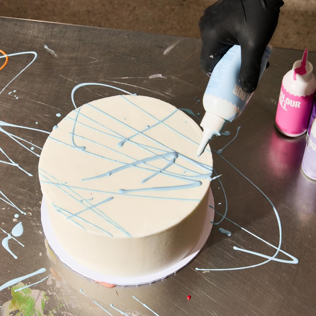 Colour Mill Chocolate Drip Easy-Melt drizzle across cakes for a glossy finish.
