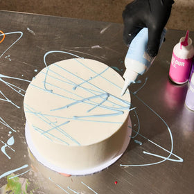 Colour Mill Chocolate Drip Easy-Melt drizzle across cakes for a glossy finish.