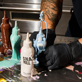 Colour Mill Baby Blue pour enables precise drizzle for elegant dessert details.