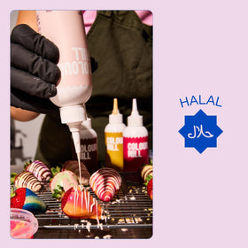 Colour Mill Chocolate Drip Easy-Melt on macarons for precise accents.