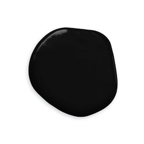 Colour Mill oil-based coloring in a black bottle for smooth buttercream color pours.