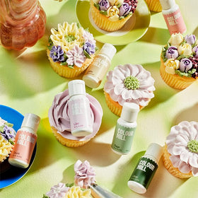 Six-pack Colour Mill dyes mix evenly into Swiss meringue colors.
