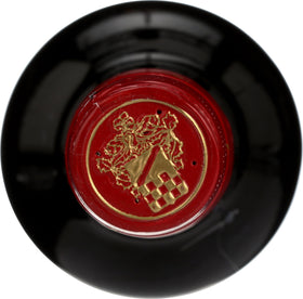 Columela Classic Sherry Vinegar on a salad plate boosting Mediterranean flavors.