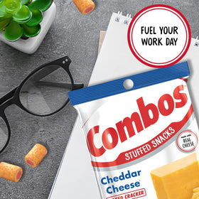 Combos Cheddar Crackers cheese filling close-up, rich cheddar flavor.