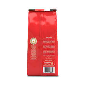 Close-up of Community Coffee Breakfast Blend Arabica beans with smooth roast.