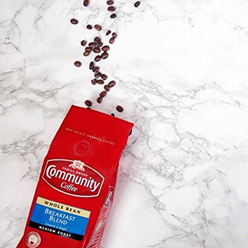 Roasting scene of Community Coffee Breakfast Blend emphasizes rich flavor development.