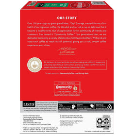 Decaf pod being inserted into a brewer with Community Coffee branding.