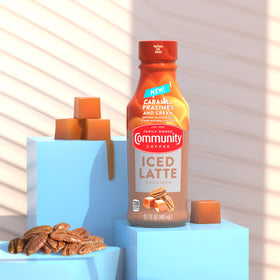 Close-up of Community Coffee iced latte reveals caramel praline texture and creaminess.