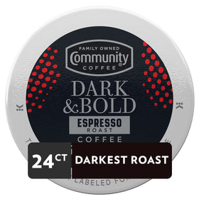 Box and pods of Community Coffee Dark & Bold Espresso Roast on a kitchen counter.