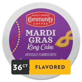 Steaming cup from Mardi Gras King Cake pods shows inviting aroma.