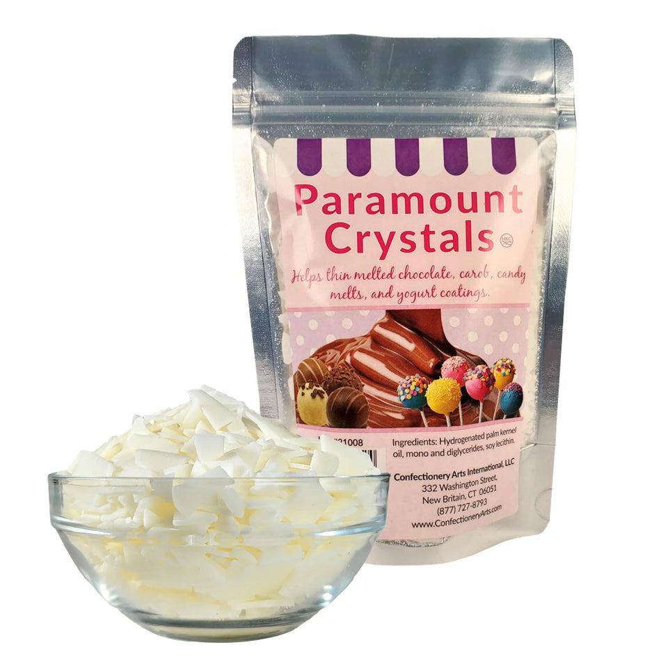 Confectionery Arts Paramount Crystals thin chocolate for smooth, glossy coatings.