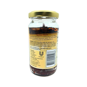 Conimex Sambal Manis jar close-up showing glossy mild chili paste.