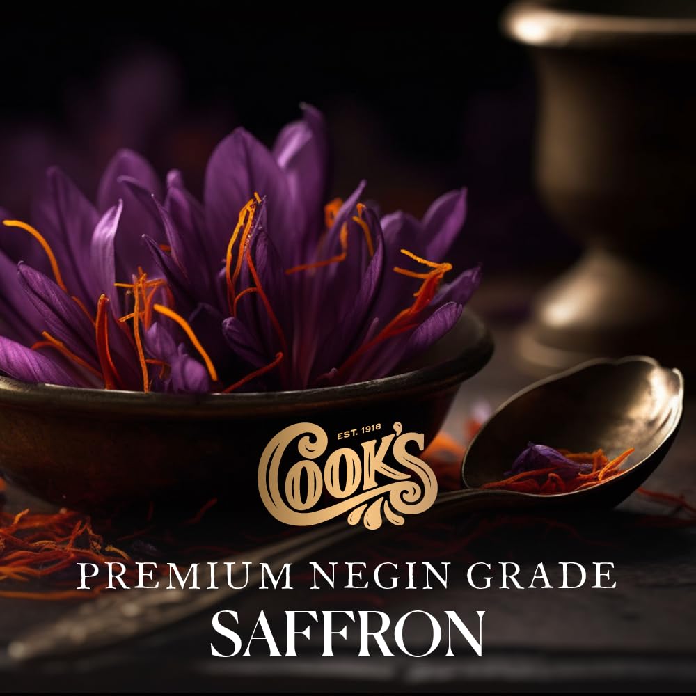 Cook’s saffron threads in tea ready to infuse warm, aromatic flavor.