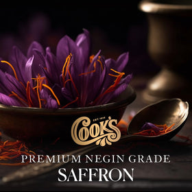Cook’s saffron threads in tea ready to infuse warm, aromatic flavor.
