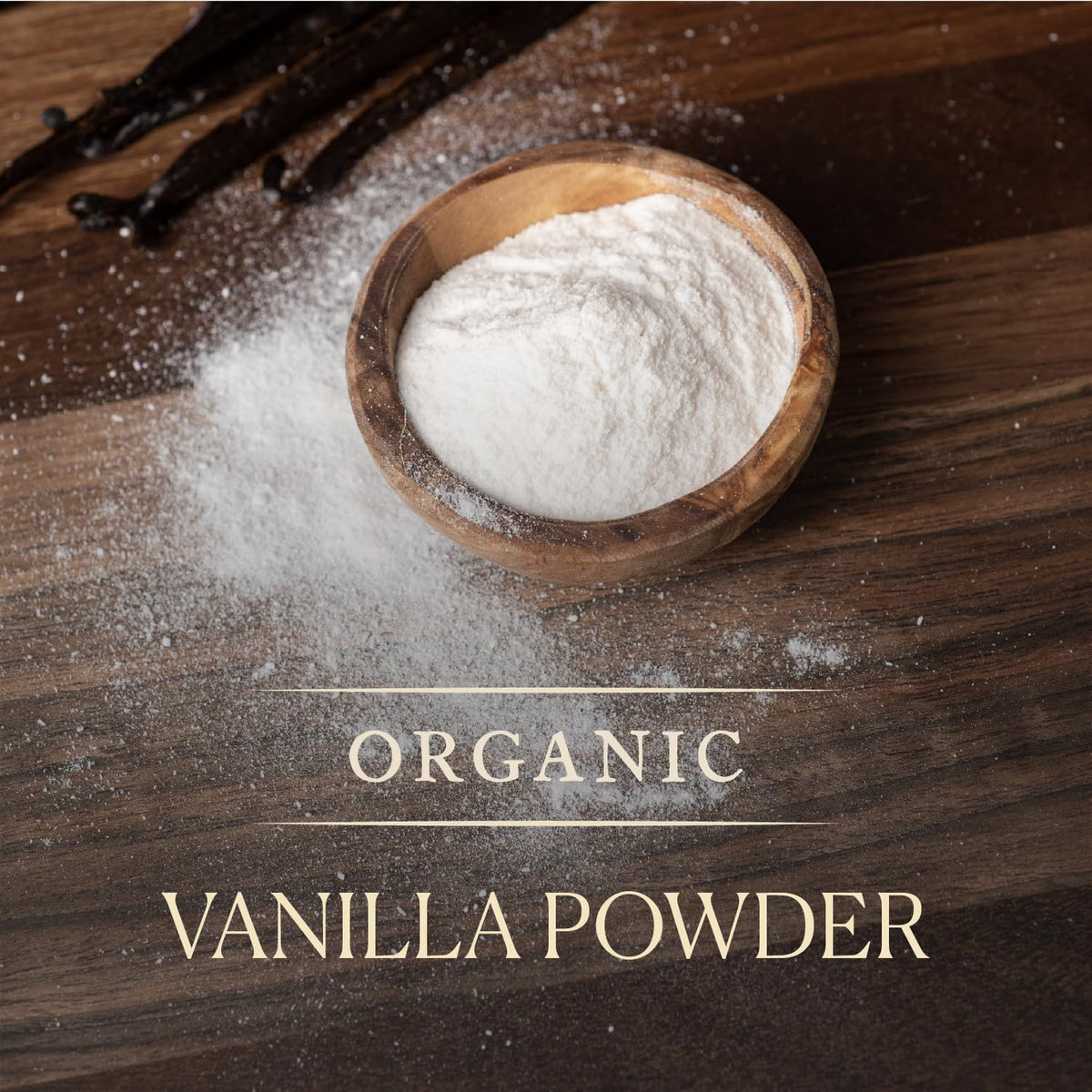 Close-up of Cook's Vanilla Powder being dispensed with a spoon.