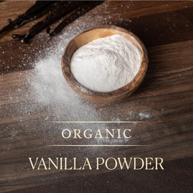 Close-up of Cook's Vanilla Powder being dispensed with a spoon.