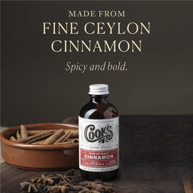 Cook's Pure Cinnamon Extract bottle closeup with amber glass
