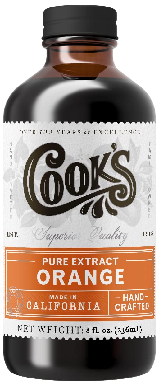 COOK'S Pure Orange Extract bottle front, ideal for citrus desserts and drinks.