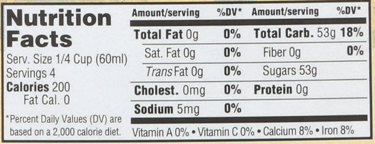 Close-up of the Coombs Family Farms Grade A Amber Rich label, highlighting non-GMO and Kosher certification.