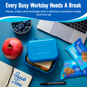 Cooper Street Granola bar beside a lunchbox highlighting school-safe everyday snack.