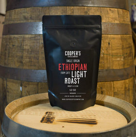 Cooper's Cask 2lb bag packaging showcases premium whole bean presentation.
