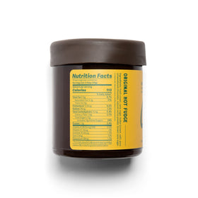 Coop's Original Hot Fudge Sauce drizzled on vanilla ice cream for rich indulgence.