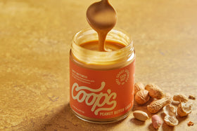 Coop's Peanut Butter Sauce with pretzels for a sweet-salty treat