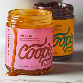 Coop's Original Salted Caramel Sauce close-up reveals glossy texture.
