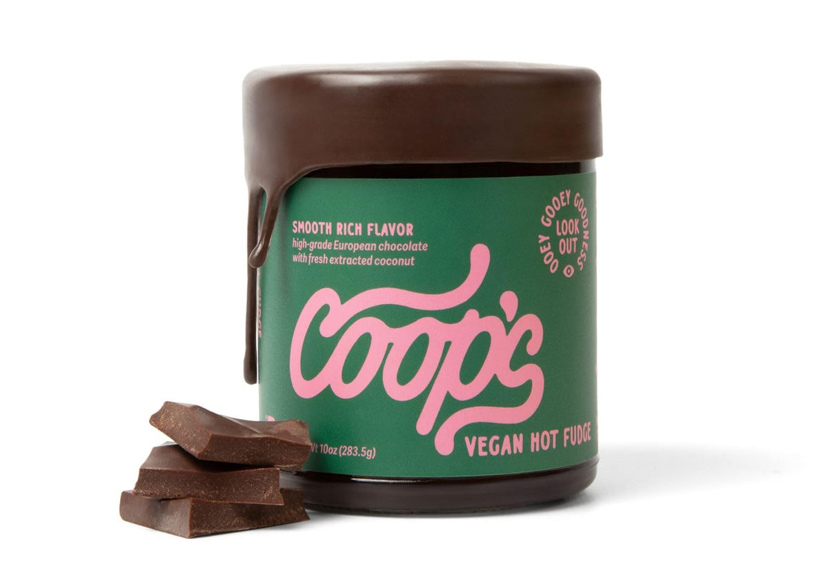 Coop's Vegan Hot Fudge Sauce in a jar, rich and dairy-free, ideal for desserts.