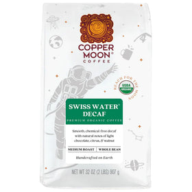 Copper Moon coffee bag front view shows Swiss Water decaf for pure flavor