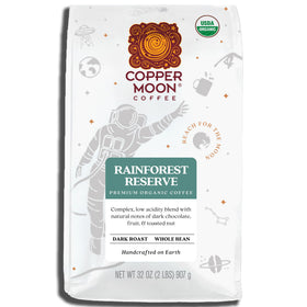 Copper Moon Dark Roast coffee beans ready for grinding and brewing
