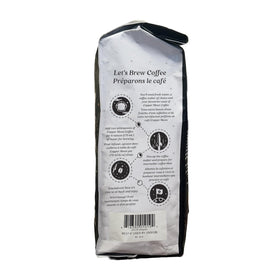 Copper Moon roasted beans pour into mug, signaling rich flavor potential