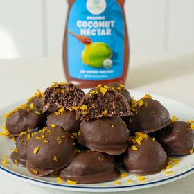 Copra Coconut Nectar on pancakes highlights natural sweetness for breakfast.