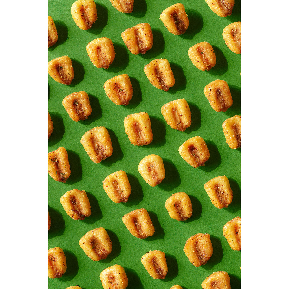 Desk or coffee table setup featuring Corn Nuts Mexican Style Street Corn for snacking