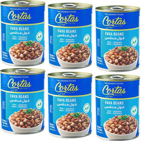 Cortas fava beans six-pack can on shelf, protein-rich nourishment.