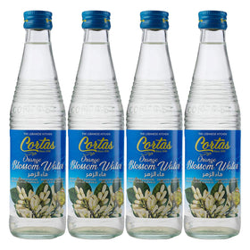 Cortas orange blossom water bottle front view, four-pack, ideal for flavoring drinks.