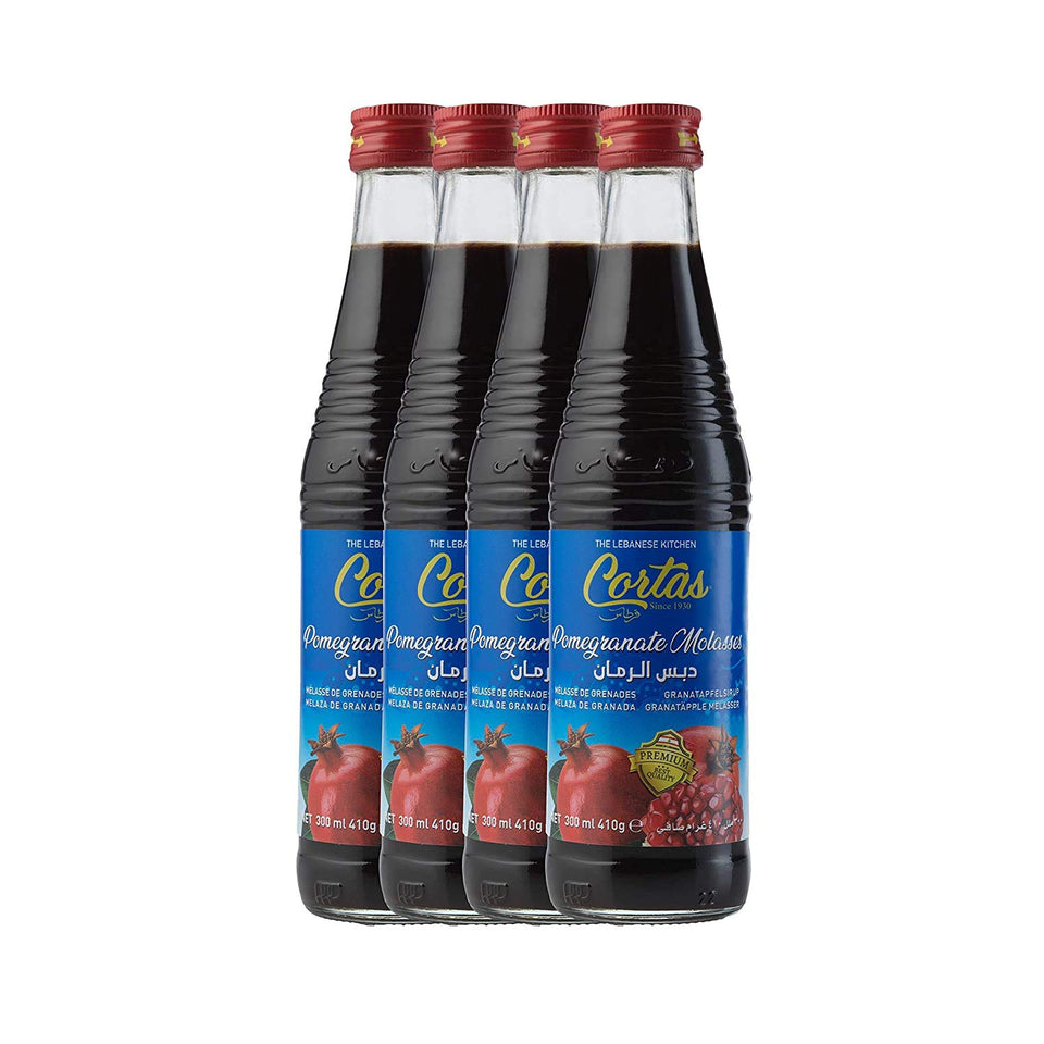 Cortas Pomegranate Molasses bottle closeup shows rich color, perfect for dressings and glazes.