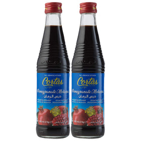 Cortas pomegranate molasses bottle highlighting rich ruby color for dressings