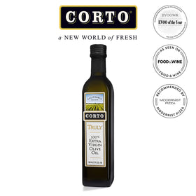 Close-up of delicate floral notes in CORTO TRULY olive oil for aromatic finishing.